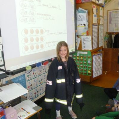 Trying on the fireman's jacket  in Class 1_2R